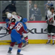 Colorado’s Nathan MacKinnon tosses the Coyote Connor Garland’s helmet at his head last night.
